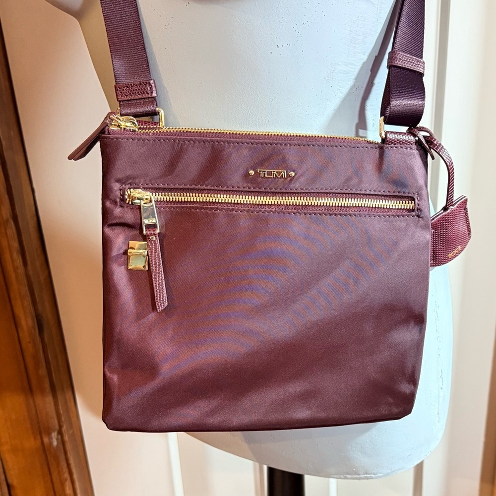 Tumi Plum Tia Voyager Crossbody Bag with Gold Accents